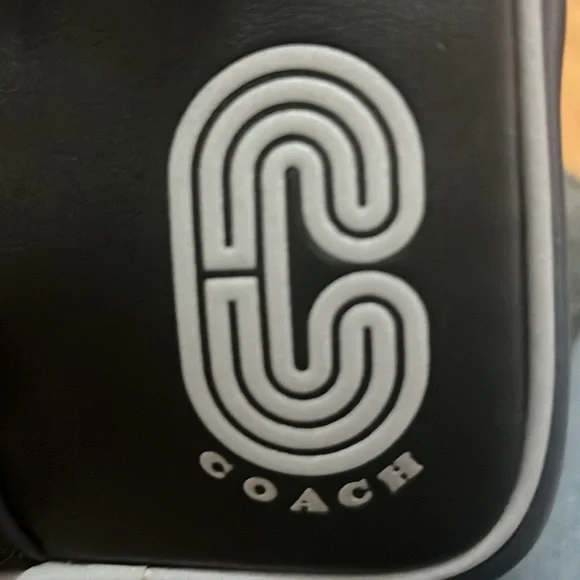 Coach north/south leather pouch